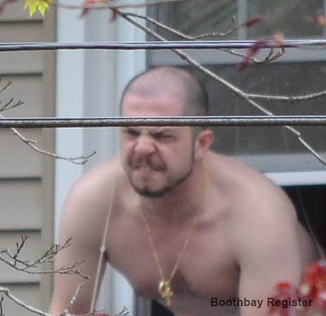 Konstantinos Rigas speaks with police from an upstairs bedroom at 31 Oak St. during the standoff. JOSEPH CHARPENTIER/Boothbay Register