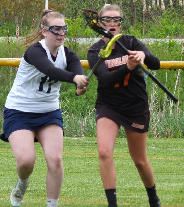Boothbay defender Kylie Brown watches a Winslow attacker May 29 during a Class C match in Boothbay Harbor. BILL PEARSON/Boothbay Register