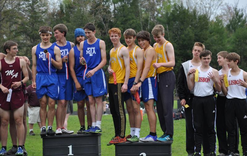 Boothbay, second from left, takes second place in the 4x800 relay. Courtesy of Kerrin Erhard