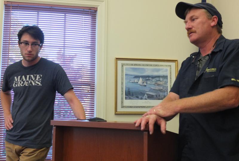 Boothbay Region Television station manager Cody Mitchell, left, and his father, local businessman Win Mitchell, encourage selectmen to renegotiate the town’s cable franchise agreement with Spectrum following new legislation which improves municipalities’ bargaining position. BILL PEARSON/Boothbay Register
