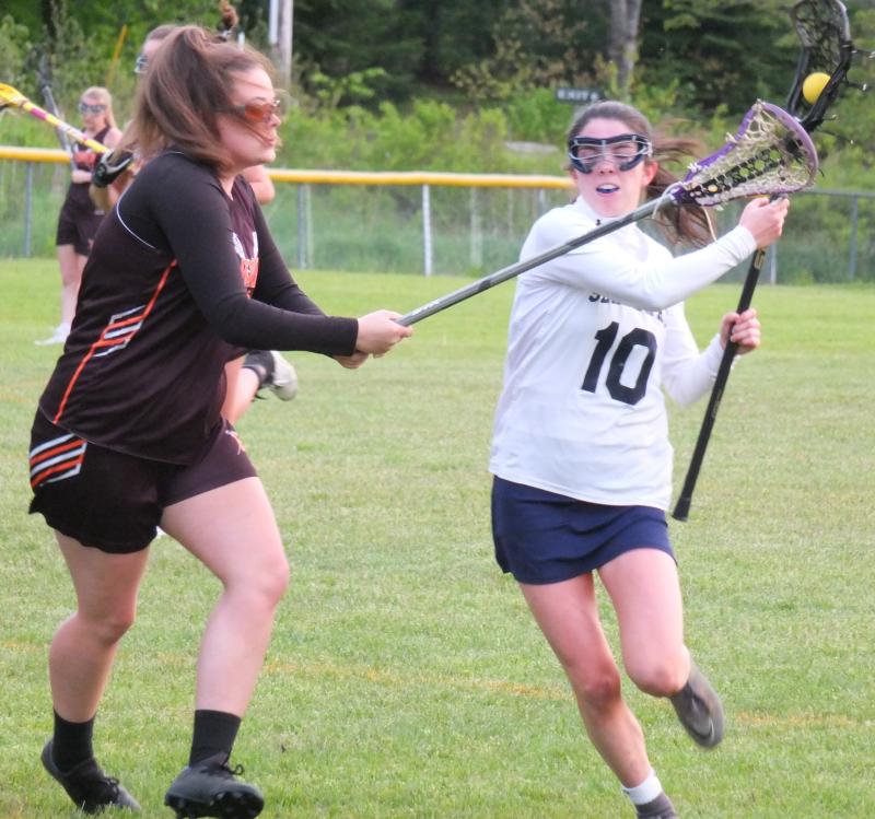 Boothbay senior Reagan Cola had three goals May 31 against the combined Hall-Dale/Gardiner team in schoolgirl lacrosse action. Boothbay won, 9-4, and finished sixth in the Class C Heal point standings. BILL PEARSON/Boothbay Register