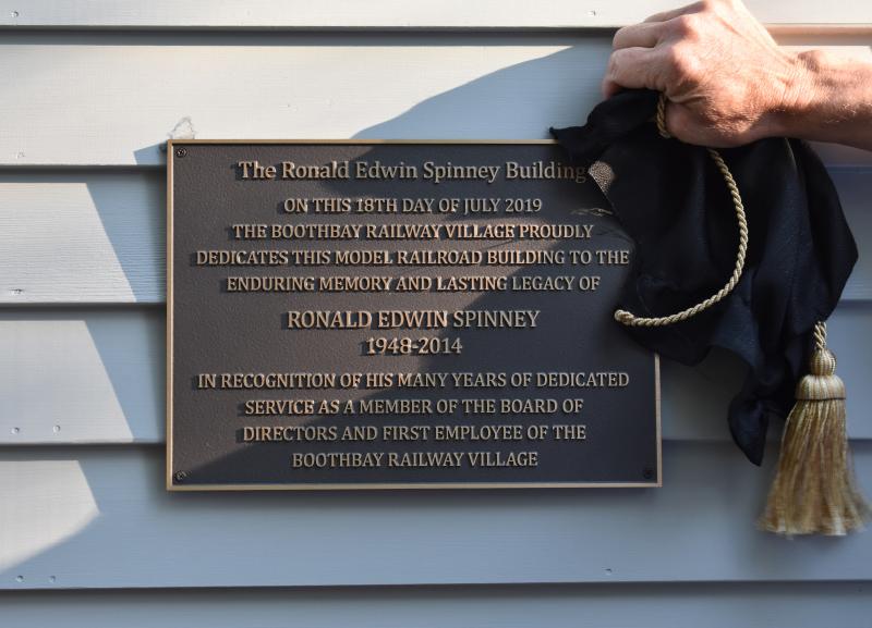 The unveiling of the Spinney Building plaque. Courtesy of Kate Steed