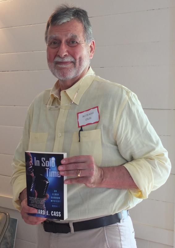 Richard Cass of Portland brought three of his books, “In Solo Time,” “Solo Act,” and “Last Call at Esposito’s” to the Books in Boothbay event at Boothbay Railway Village. BILL PEARSON/Boothbay Register