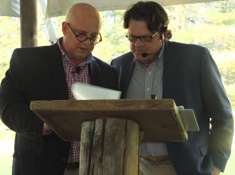 Thomaston Auction Place Galleries auctioneers John Buttero, left, and Kaja Veilleux conduct the Aug. 8 auction which was the BRLT’s largest fundraiser ever. BILL PEARSON/Boothbay Register