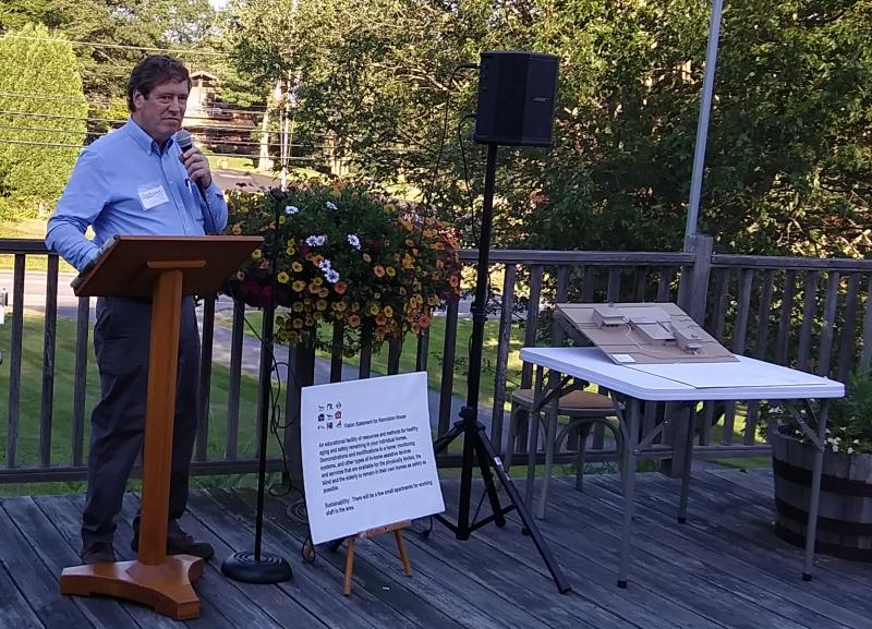 Dr. Chip Teel explains plans for Kenniston House to guests on Wednesday, August 14 at Boothbay Harbor Region Chamber of Commerce’s Business After Hours. JANE CARPENTER/Boothbay Register