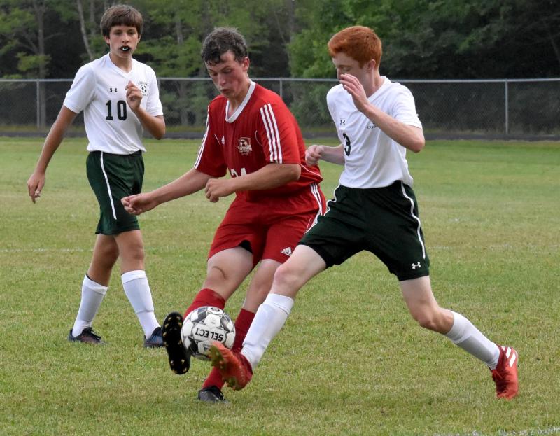 Brian Foye is pictured with Carrabec’s Vern Worthen, left, and Luke Carey. PHIL DI VECE/Wiscasset Newspaper