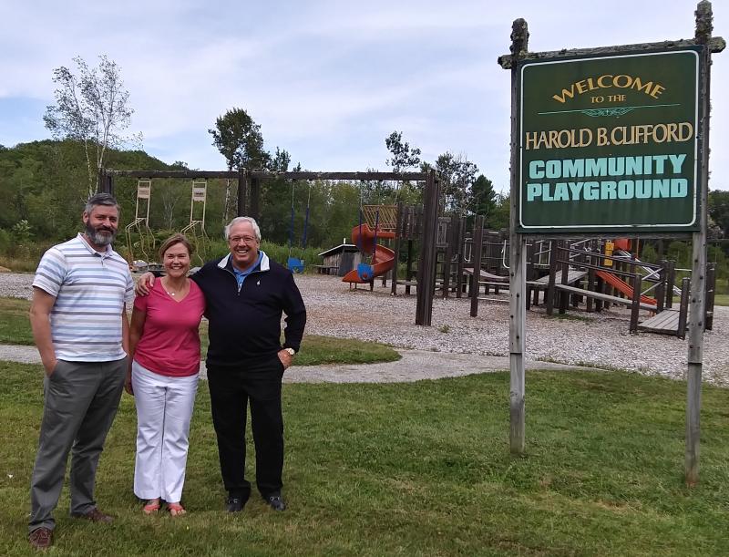 Boothbay Town Manager Dan Bryer, left, Julie Roberts and philanthropist Paul Coulombe hope to make the Clifford playground a multi-generational community space next year. The park was named for Harold B. Clifford who served as school superintendent from 1925 to 1956. JANE CARPENTER/Boothbay Register