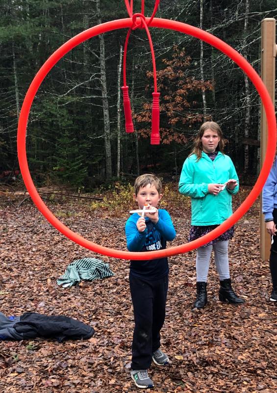 Ryder Baker goes for gold at the Shoot the Hoop station. JENNY BENNETT/Boothbay Register