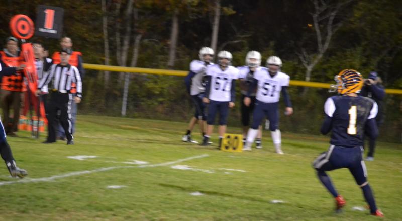 Instead of running a deep pattern, Boothbay receiver Michael Hollowell throws long on a flea flicker. BILL PEARSON/Boothbay Register