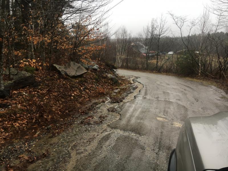 Gaecklein Road, eroding in the heavy rain, sends a load of sediment to Knickerbocker Lake. Courtesy of BRWD