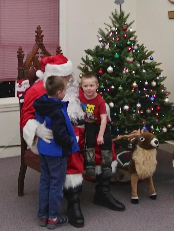 Landyn and Alden Peters ask Santa for Pokemon. JANE CARPENTER/Boothbay Register