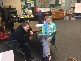 Fourth grade and seventh grade reading buddies. Courtesy photo