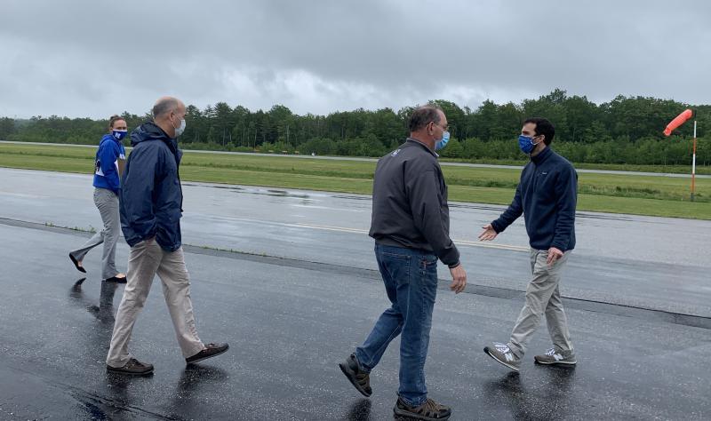 From left, Morse High School Assistant Principal Devon Gallice, RSU 1 Superintendent of Schools Patrick Manuel and RSU 1 Director of Facilities David Richards follow Principal Eric Varney along the apron at Wiscasset Municipal Airport June 11. SUSAN JOHNS/Wiscasset Newspaper