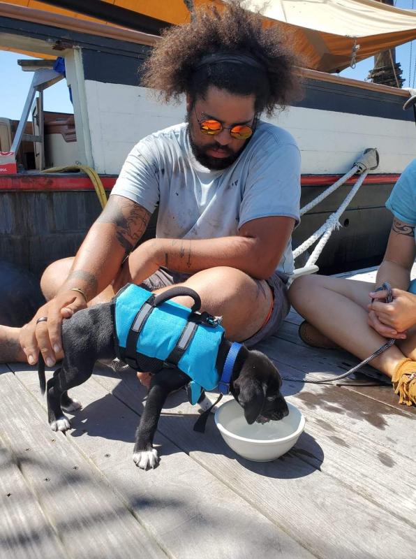 Casey helps fit Casey for his first life jacket. Courtesy photo