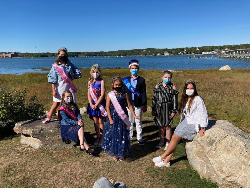 From left are Miss Windjammer winners and King of the Harbor: Sarah Harris (2018), Sophia Mansfield (2018), Alana LaCourse (2019), Scout Martin (2020), Spencer Pottle (2018), Suzie Edwards (2017), and Emerson Harris (2016). Emily Mirabile photo