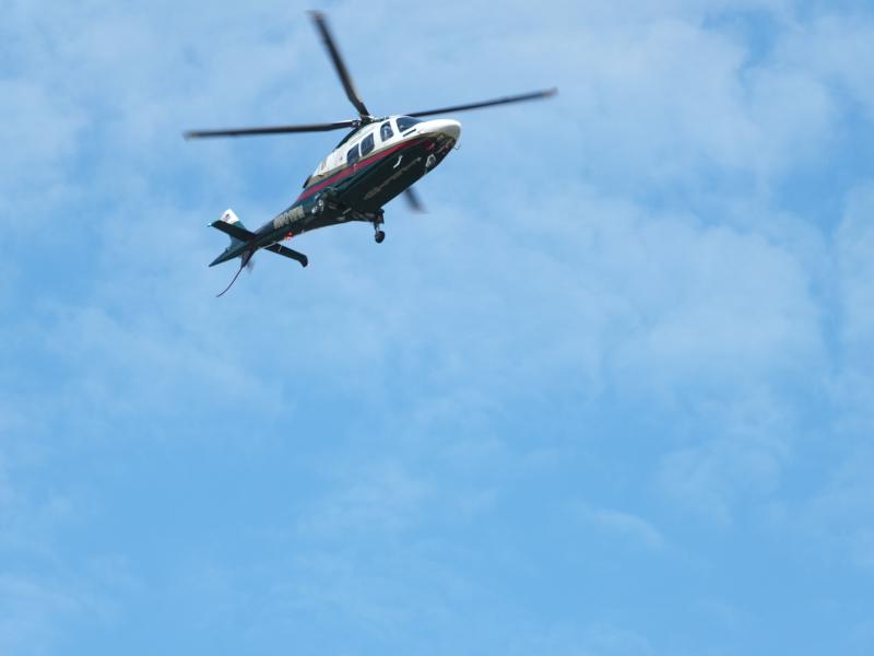 A landscaper is transported by Lifeflight of Maine on Oct. 6 to Maine Medical Center after his weed trimmer came apart. BILL PEARSON/Boothbay Register