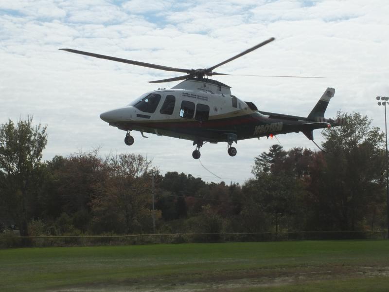 A Lifeflight of Maine helicopter lands Oct. 6 at the Boothbay Region High School football field to transport an injured landscaper working on Southport to Maine Medical Center. BILL PEARSON/Boothbay Register