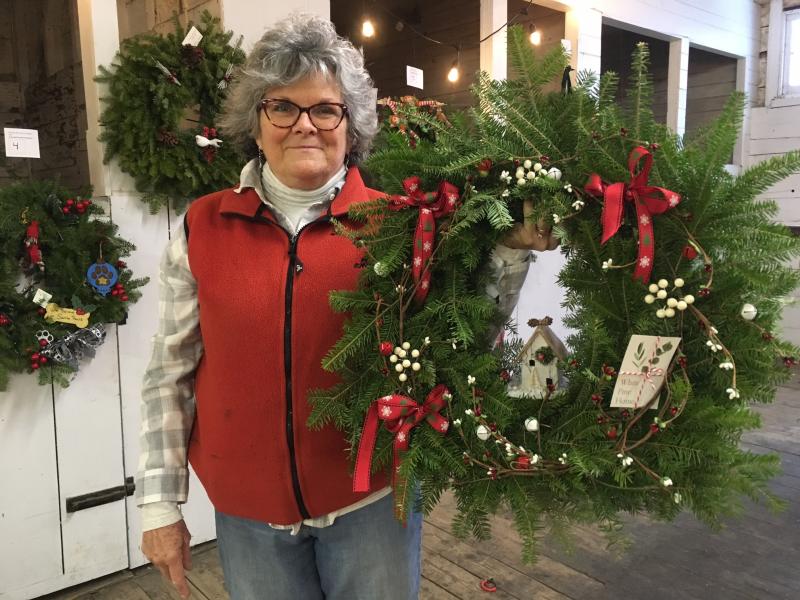 Wiscasset Holiday Marketfest will feature Wreaths Around the Holidays, wreaths decorated by Wiscasset Area Chamber of Commerce members. In 2019, this wreath from White Pine Home owner Betsy Kyle won People’s Choice. Wiscasset Holiday Marketfest photo