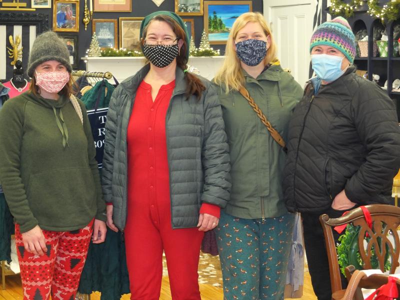 Ellen Newton of Boothbay was joined by daughters, from left, Holly White, Sybil King and Leah Kelsch shopping during the 32nd Annual Early Bird event. BILL PEARSON/Boothbay Register