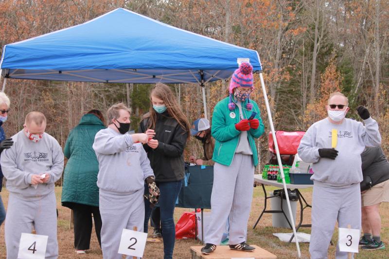 Division 2 Special Olympians celebrate a fulfilling skills competition despite masks and distancing from friends. From left, Danny Miller, Matt Farnham, Grace Giles and Donny Dunning. Courtesy photo