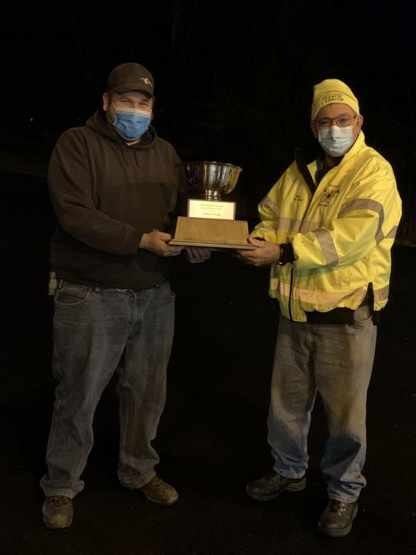 Boothbay Fire Chief Dick Spofford, right, presents the Dalmatian Award to Nobleboro Fire Chief Richard Genthner. Jennie Mitchell photo