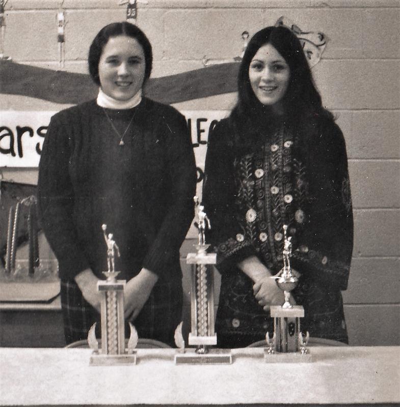 Sherri Williams, left, and Laurie Reed receive awards at a basketball banquet. Boothbay Register file photo