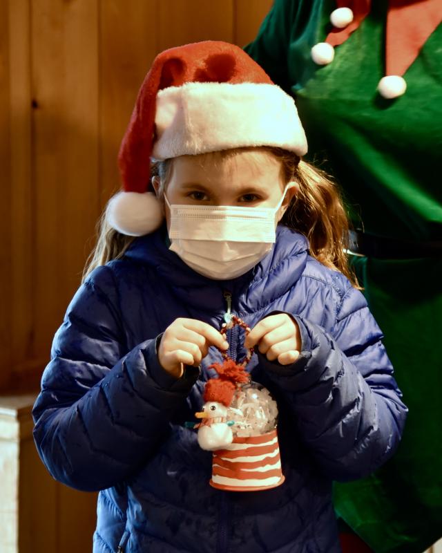 Evelyn Lessner with her winning ornament in the 8 and under division. Bob Crink photo