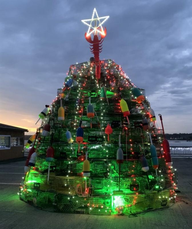 The Waterfront Park Preservation Committee’s lobster trap tree is lit as part of Boothbay Lights. KEVIN BURNHAM/Boothbay Register