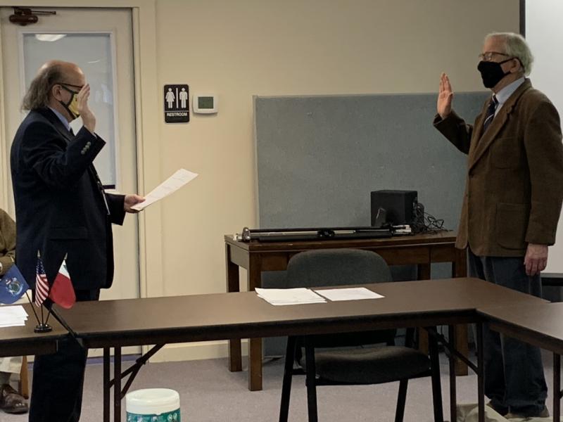 Commissioner Hamilton Meserve is sworn in for another term Jan. 5 as Dedimus Justice Matt Dunlap of Old Town officiates the ceremony. BILL PEARSON/Boothbay Register