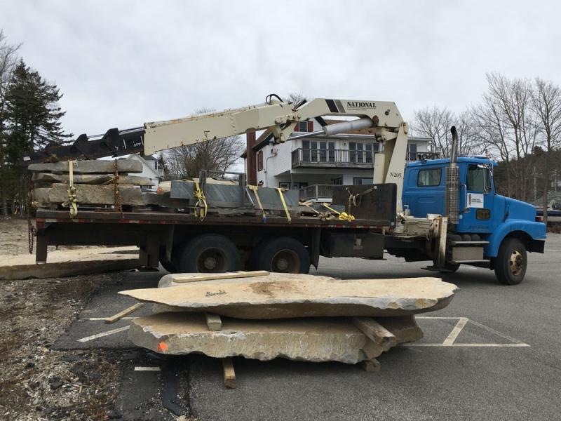 Stones being delivered March 25 to the Eastside Waterfront Park for construction of the tidal access feature of the park. These stones along with the existing rip rap will constitute a sea wall and a place for people to get down to the water on the north side of the park. Courtesy of Boothbay Harbor Waterfront Preservation