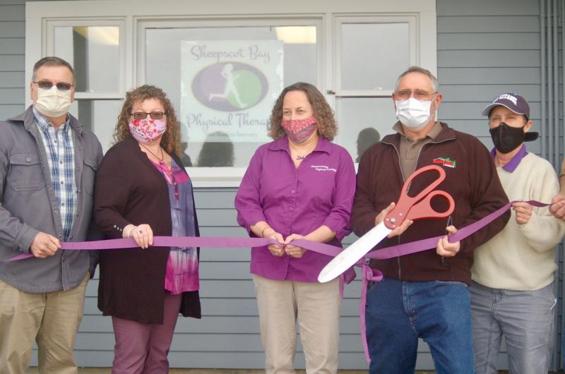 Wiscasset Town Manager Dennis Simmons, business member Janie Miller, Dr. Jean Beattie, chamber president Chip Davison and PTA Maureen Reed cut the ribbon. ART MAYERS/Wiscasset Newspaper