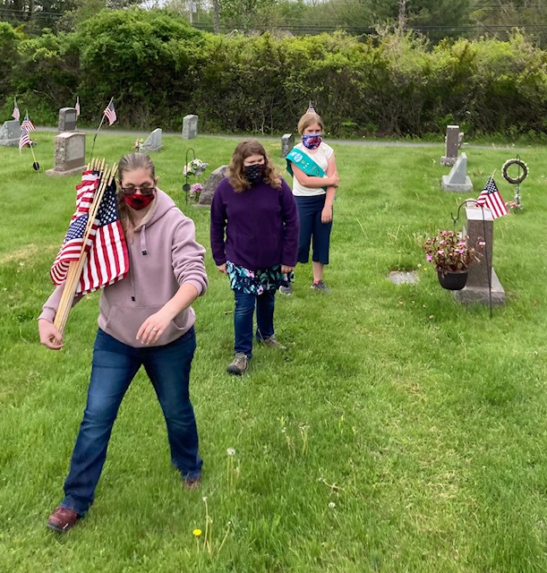 Flag placement at Evergreen Cemetery. Christopher Armstead photo