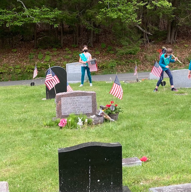 Flag placement at Evergreen Cemetery. Christopher Armstead photo