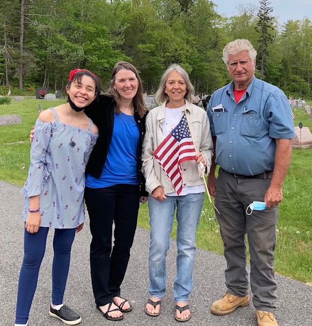 Helping to place flags in Evergreen Cemetery in Boothbay on Saturday, May 22 were, from left, Imij Armstead, Gretchen Armstead, Kris Ward and Guy Peaslee. Christopher Armstead photo