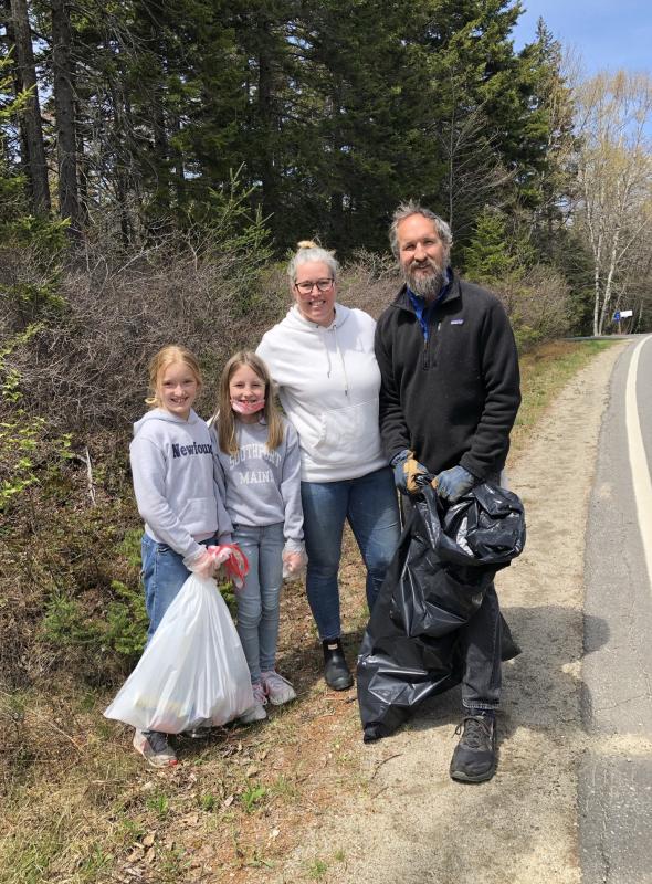 Georgia Griffith, Mabel Kaler, Amy Redfern Griffith and Shawn Griffith pick up trash along the side of Route 27 on the west side of the island. JENNY BENNETT/Boothbay Register