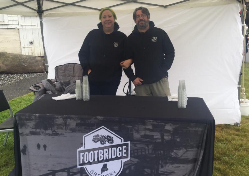 Footbridge Brewery’s Pnina and Dan Pangburn unveil new brew “Companion” of which a portion of proceeds will go to Action for Animals. JOSEPH CHARPENTIER/Boothbay Register