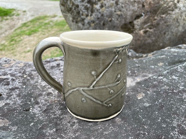 A Mitchell Lichtenstein mug with slip trailing decoration. Courtesy photo Mitchell Lichtenstein