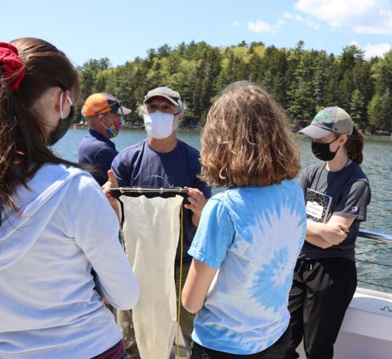 Collecting zooplankton and phytoplankton with Dr. Fields. Courtesy of Bruce Wood