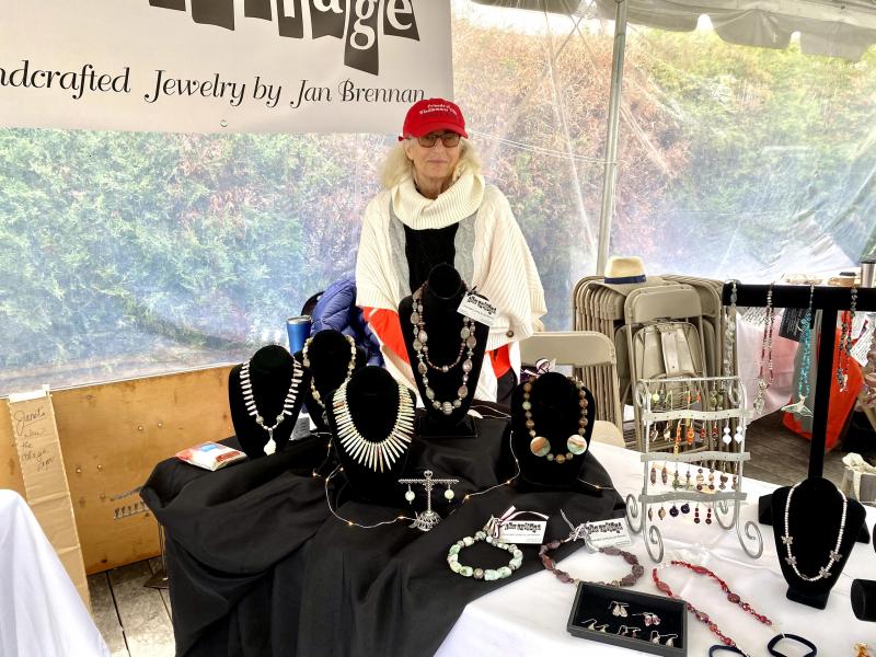 Event veteran Janet Brennan of the collage jewelry, with her handmade jewelry. ISABELLE CURTIS//Boothbay Register