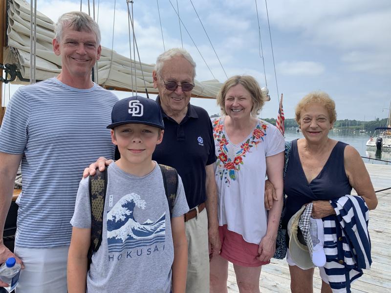 Beside the docked 1939, Wiscasset-built schooner When and If in Wiscasset Aug. 21 are Virginia’s Greg Terry, son Jake Terry, Greg’s father Denny Terry, Greg’s sister Susie Terry and Denny’s fiancee Patricia Stauble of Edgecomb. SUSAN JOHNS/Wiscasset Newspaper