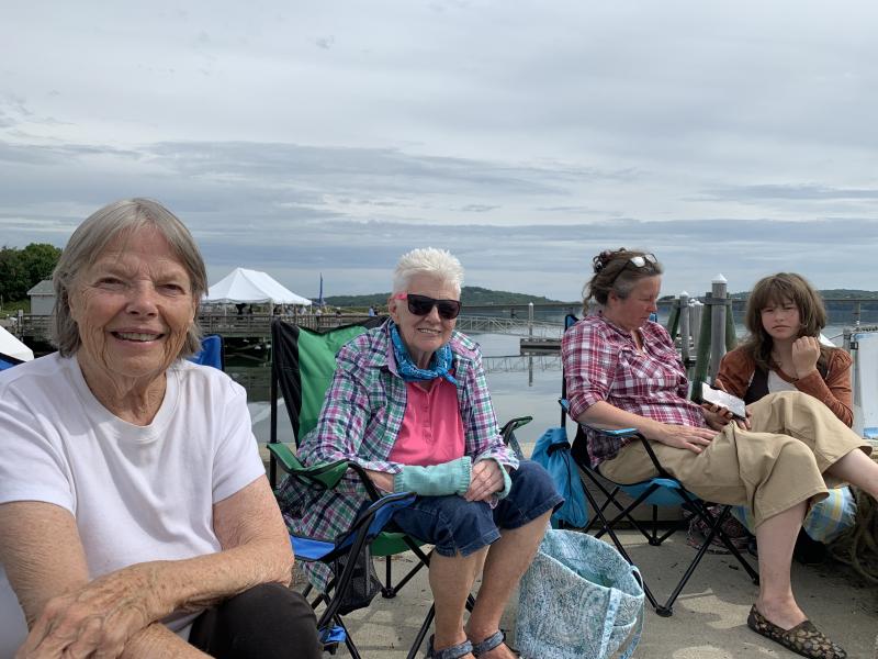 From left, Ethel Stansfield of Wiscasset and Helen Delano, Kelly Delano and Kelly’s daughter Daisy, 12, all of Westport Island watch the schooners come into Wiscasset harbor Aug. 19 for Schoonerfest. SUSAN JOHNS/Wiscasset Newspaper