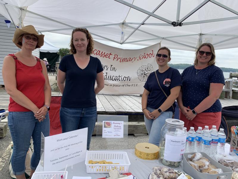 Partners in Education members, from left, Beth Bluteau of Wiscasset, Alna’s Kim Averill and Wendy Terrance and Jodi Hardwick, both of Wiscasset, run a bake sale Aug. 21 at Schoonerfest. SUSAN JOHNS/Wiscasset Newspaper