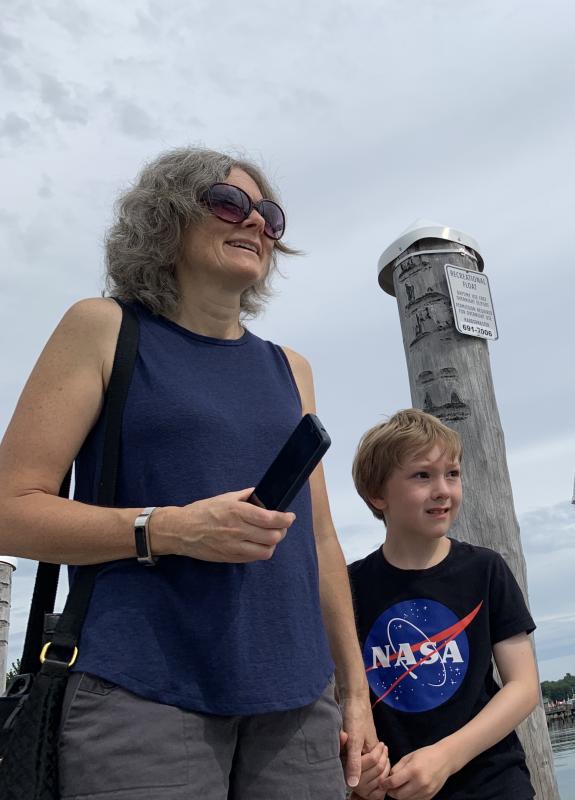 Wiscasset’s Lisa Truesdell and son Miles, 7, watch the When and If arrive. SUSAN JOHNS/Wiscasset Newspaper