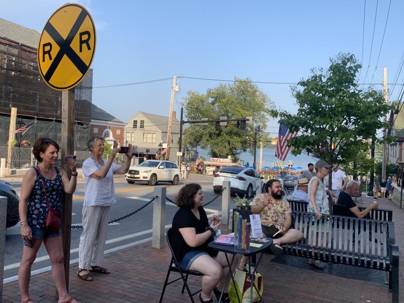 Art walk goers watch and photograph the hip hop dancing. SUSAN JOHNS/Wiscasset Newspaper