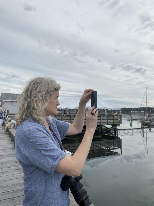 Ann Scanlan captures the schooners’ arrival. SUSAN JOHNS/Wiscasset Newspaper