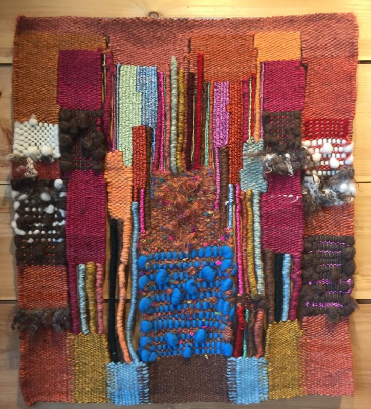 “Earth Daughter,” a wool warp, wool and silk weft creation by Priscilla Alden, is 28” x 26.” Priscilla Alden