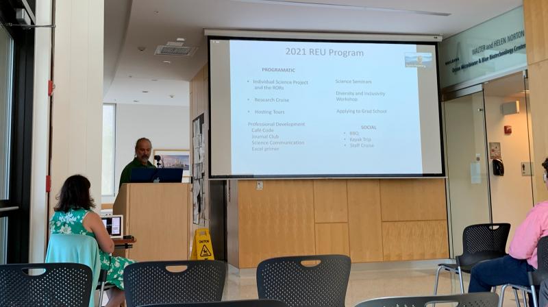Dr. David Fields presents the activities REU students engage in during their 10 weeks at Bigelow, such as applying to graduate school, participating in a cruise and going on a kayak trip. LILLY CURTIS/Boothbay Register