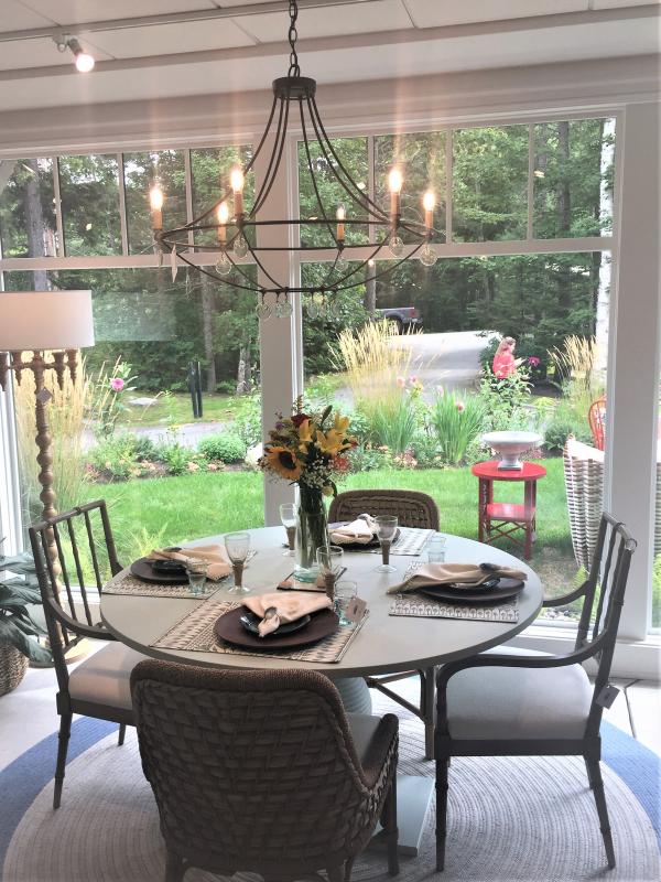 This dining room shows clients, chairs do not have to match. Here, two different styles complement and draw attention to their design elements. LISA KRISTOFF/Boothbay Register COVE by Knickerbocker Group