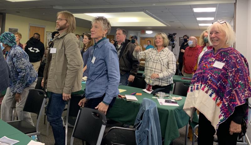 Attendees rise to say in unison, “relationships.” SUSAN JOHNS/Wiscasset Newspaper