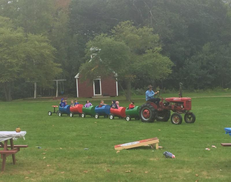 Corn hole and barrel train rides on the Village Green. LISA KRISTOFF/Boothbay Register